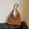 Bolso tote grande de moda coreana 2026, estilo niche retro, un bolso de hombro versátil con un toque de alta gama