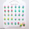 Decorações de unhas florais de cor sólida, com tema de primavera e versáteis, apresentando designs delicados e tridimensionais de folhas e flores, adequadas para esmalte, capas de celular e artesanato em resina.