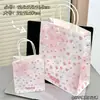 Bolsa de regalo alto valor de color ins bolsa de papel kraft estudiante exquisito regalo bolsa de embalaje de regalo caricatura linda bolso