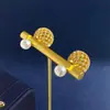 Fuente en Vivo Medio Antiguo D Hogar Estilo Coreano Perla Colgante Hueco Completamente Diamante Pendientes Mujer Viento Frío Personalidad Pendientes