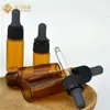 Spot Wholesale Botella de Vidrio Marrón Pequeña de 1ml 2ml 3ml para Dispensar Aceite Esencial Botella Marrón con Tubo Botella de Muestra Material de Empaque