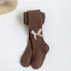 Medias para niños bebé primavera y otoño calcetines de capa base infantil productos transfronterizos calcetines de una pieza con lazo pantalones de capa base para niña venta al por mayor