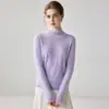 Elegante suéter de cachemir para mujer con puños de borlas, cuello semi-alto, color liso y un diseño de punto versátil y femenino.