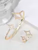 Pulsera de Moda de Lujo Shining Light Transfronteriza Marca A Estrella Explosiva de Diamante Completo Estrella de Cuatro Puntas Pulsera de Anillo Hueco Juego de Pulsera Decoración