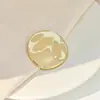 Europa e Estados Unidos Broche de anjinho girassol criativo transfronteiriço simples liso doce plissado águia pino de aço inoxidável