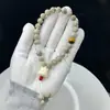 Pulseira de Contas de Bodhi Sombra Verde de Hainan com Gato da Sorte Estilo Chinês Contas de Bodhi de Alta Densidade Dai Contas de Oração Budistas de Mão