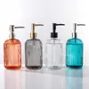 Botella de vidrio de color para desinfectante de manos con emulsión tipo dispensador de presión botella de jabón champú gel de ducha rellenables