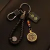 Llavero para coche Bao Shi para hombre y mujer latón 12 signos del zodíaco llavero colgante hecho a mano retro creativo mano de dinero para hombre