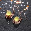 Joyería Elyuan estilo chino clásico aretes cheongsam Hanfu con incrustaciones de ámbar azul sintético ámbar aretes aretes para mujer