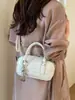 Bolsa de bolos para mujer, nuevo estilo coreano de moda primavera 2026, bolso de mano de alta gama versátil para el hombro y cruzado para el trabajo