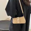 Bolso tipo baguette texturizado de alta calidad para mujer, nuevo estilo verano 2026, elegante bolso retro para hombro o axila, bolso cruzado versátil y moderno