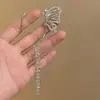 Pendientes de Borla de Metal y Perla Estilo Coreano de Lujo Ligero con Flores Afelpadas, Diamantes Brillantes, Felpa de Copo de Nieve, Pendientes Modernos y Versátiles