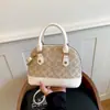 Bolsa Nova Outono 2026 Bolsa Concha Estilo Retrô Luxo Leve Moda Tendência Versátil Bolsa de Ombro Transversal Bolsa Feminina