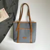 Bolsa feminina de grande capacidade transfronteiriça, nova coleção outono 2026, versátil, moda, ombro único, tendência, para o trabalho, retrô, casual, bolsa tote