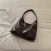 Bolsa Tote de Ombro Popular de Grande Capacidade para o Dia a Dia Outono 2026 Novo Estilo Cor Sólida Textura Simples Bolsa de Ombro Casual para Mulheres