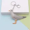 Dijes Originales y Creativos para Bolsos de Cuero de Jibei: Diseños Lindos de Paloma Pequeña, Gaviota y Pez Dorado