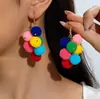 Aretes Navideños de Bolas de Pelo de Color Tejido de Color Confrontado Transfronterizo Europeo y Americano Diseño Nicho Cuentas de Arroz Aretes Navideños Mujeres