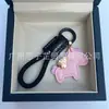 Dinero en el Caballo Cuero de Vaca Creativo Exquisito Casual Regalo de Pareja Bolso Lindo Colgante Llavero de Coche Llavero
