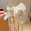 Accesorio para el cabello Hanfu para niñas, pasador de flor de lazo colorido estilo antiguo, tocado de princesa de disfraz súper de hadas con borlas