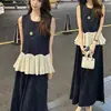 Saia de Conjunto Fashion para Mulheres 2025 Verão Novo Estilo Estilo Estrangeiro Folha de Lótus Costura Sem Mangas Conjunto de Duas Peças com Zíper