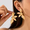 Venta Caliente Transfronteriza Pendientes de Rayas Verticales Flor de Cuatro Pétalos Estilo Retro Europeo y Americano Joyas para Orejas de Metal Tridimensionales de Lujo Ligero Al por Mayor