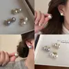 Pendientes de aro de moda, versátiles y elegantes, lujo ligero con un toque de alta gama, clips para orejas de circonita sintética, pendientes de perlas para mujer, pendientes para el cuidado de perforaciones