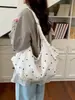 Bolsa de tela de lunares estilo coreano para mujer, nuevo modelo 2026, bolso de hombro de gran capacidad, bolso tipo cubo tote de estilo relajado y casual