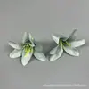 Simulación de flor de lirio pequeña lirio del valle pequeño cabeza de orquídea pequeña 7cm tocado de minoría étnica caja de regalo hecha a mano decoración