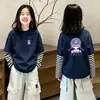 Camiseta infantil listrada de manga longa 2026 novo modelo de algodão puro top moderno e estiloso super fofa roupa de menina