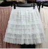 Saia de Renda em Camadas para Mulheres Verão 2026 Novo Estilo Cintura Elástica Cintura Alta Emagrecedora Saia Bolo Linha A Curta Bufante