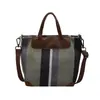 Bolso de lona rayado texturizado para mujer, gran capacidad, bolsa de mano vintage para el día a día, bolso cruzado de lona de nicho moderno y versátil