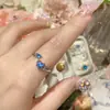 Camellia Estética Geométrica Europea y Americana Anillo Abierto en Forma de Corazón Aguamarina Set de Collares para Mujer de Lujo Ligero Diseño Francés