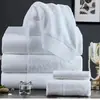 Toalla de hotel al por mayor, fábrica de algodón, toalla de baño blanca, salón de belleza, toalla absorbente gruesa para hotel, B&amp;B.