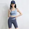 Conjunto de yoga bicolor de cintura cruzada para mujer, conjunto de dos piezas de top deportivo y shorts de cintura alta, ropa de fitness Pilates adelgazante