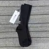 Miumiu calcetines de moda para mujer otoño e invierno calcetines de caña media letras bordadas calcetines de hada punto doble