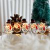 Lámpara de alambre de cobre LED transfronteriza Luz de cadena con broche navideño Anciano Muñeco de nieve Alce Copo de nieve Luz de decoración navideña Luces de festival