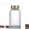 Botella Cápsula de Vidrio Transparente Transfronteriza 60ml 80ml Botella de Producto para la Salud Sellada Esmerilada Botella Vacía para Bebidas Jugo Té de Leche