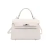 Outono 2026 Nova Bolsa Kelly Bolsa de Mão Fresca de Alto Padrão Bolsa Transversal Feminina Bolsa de Design Nicho com Sensação de Alto Padrão bolsas