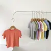 Camiseta de Modal sin Huesos para Niños Verano Manga Corta Versión Coreana Nueva Camiseta Base con Máscara Top Ropa para Niños Venta al por Mayor
