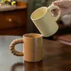 Taza Taza de Cerámica Taza de Esmalte de Sésamo Venta al por Mayor Taza de Café de Gran Capacidad Taza de Agua para el Hogar Taza Recta con Asa Retorcida