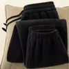 Nuevos pantalones deportivos cálidos de invierno de forro polar para hombre, elegantes y versátiles, engrosados y forrados de forro polar, pantalones de forro polar de color liso