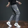Calça jeans masculina de marca da moda para primavera e outono, novo corte solto, que valoriza a altura, confortável para usar na primavera, estilo harém, com punho, calça comprida estilo workwear