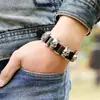 Pulsera de cuero con remaches punk europeo y americano, pulsera de cuero de vaca con aleación atmosférica y calavera retro para hombre.