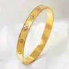 Pulsera de Trébol de Cuatro Hojas Pulsera de Acero Inoxidable para Mujer Pulsera de Acero de Titanio Color Dorado con Diamantes Estilo Blanco y Negro Joyería Que No Se Desvanece Transfronterizo