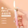 Nuevo encendedor colgante de trébol de cuatro hojas, llama abierta, recargable, diseñado para mujeres, delgado y compacto, un regalo creativo