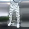 Pantalones casuales de diseño de cincha a rayas transfronteriza para hombre, joggers de corte holgado, marca de moda, duraderos, adelgazantes, pantalones harén cónicos