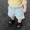 Estilo Coreano para Niños Verano 2026 Nuevo Amarillo Bordado Cuello Polo Suéter de Manga Corta Niños Rayas Azules Shorts Casuales