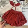Ropa Infantil Estilo Coreano 2026 Nuevo Verano Conjunto de Dos Piezas para Niñas: Top a Cuadros Bordado con Cuello de Muñeca y Shorts Florales