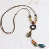 Collar de Pluma de Bronce Retro Estilo Bohemio para Mujer 2026 Cadena para Suéter Estilo Étnico Sensación de Alta Gama Accesorios de Ola Regalo