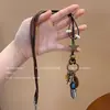 Nuevo collar tipo suéter largo estilo Zen chino para mujer, gargantilla de cuentas étnicas vintage de doble capa, cadena para clavícula de plumas de nicho